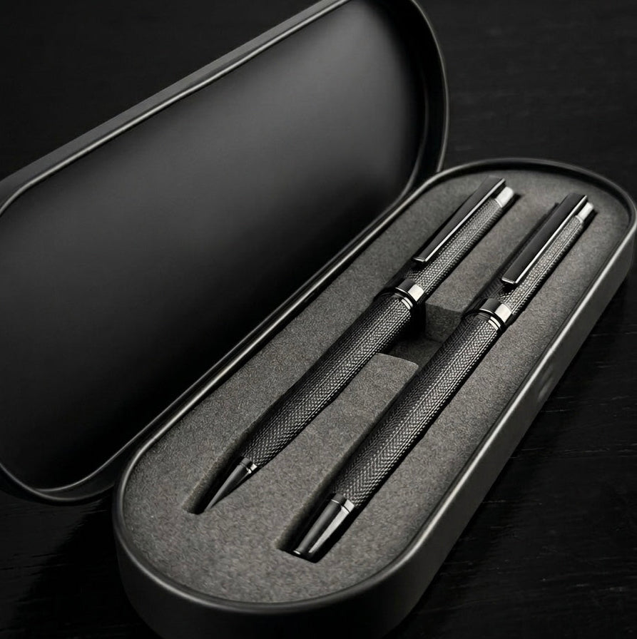 Professional black metal pen set engraving detail close-up