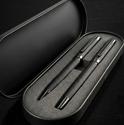 Professional black metal pen set engraving detail close-up