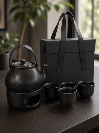 Ember Pottery Tea Set - black pottery teapot on its candle warming stand with four cups and the strapped gift box | Totem Gift Egypt