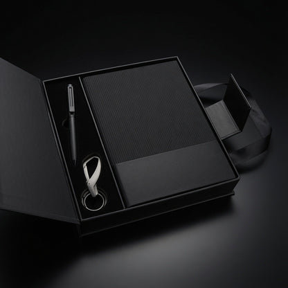 Executive Trio Gift Set open magnetic box with pen, ribbed notebook and keychain beside carry bag - Totem Gift Egypt